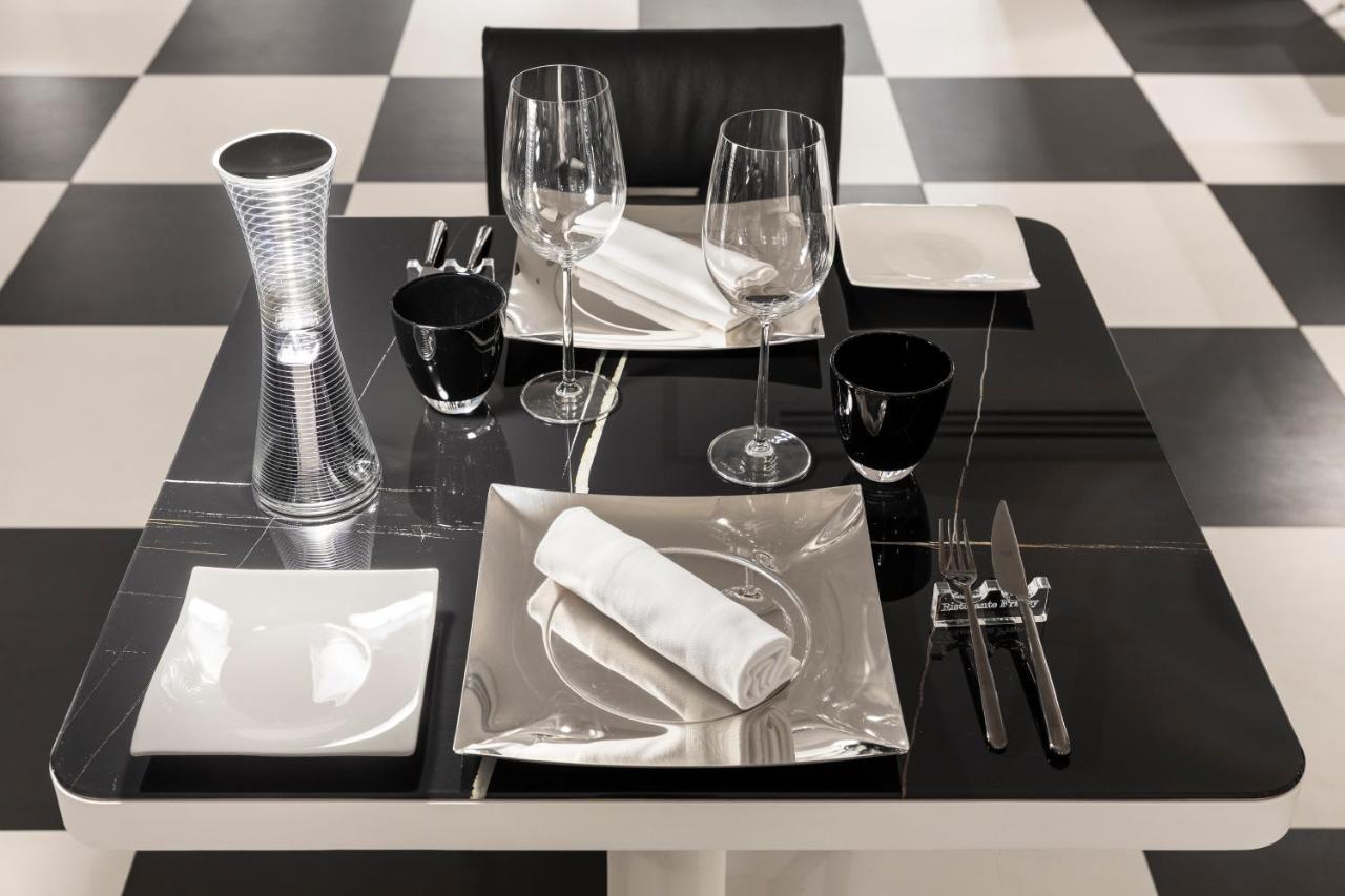 Lhp Napoli Palace & Spa Exterior photo A place setting